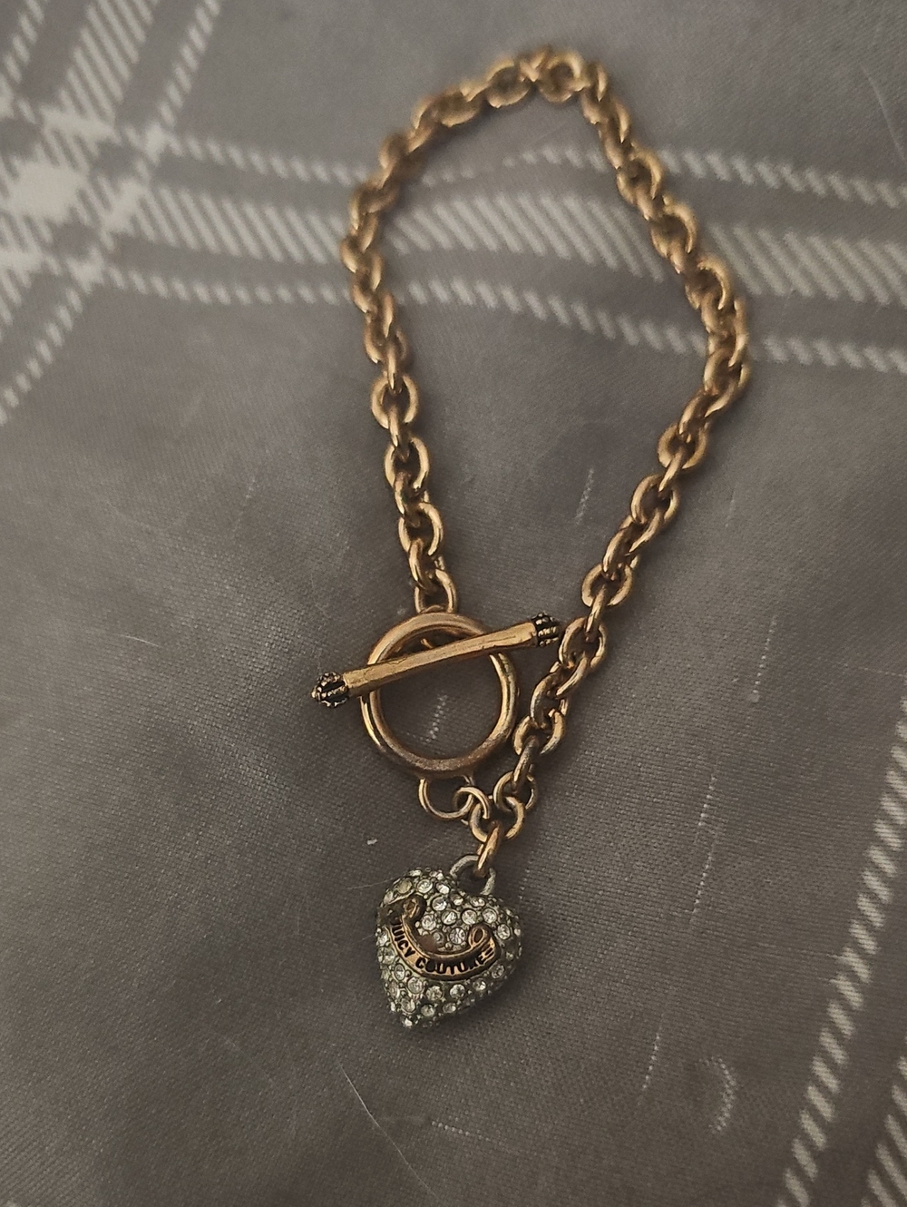 Juicy Couture Gold Tone Heart Toggle Bracelet with Crystal Charm